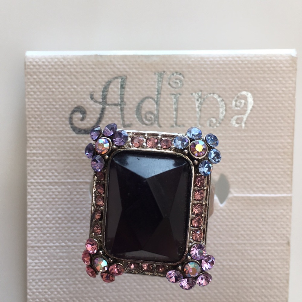 Purple stone ring.
